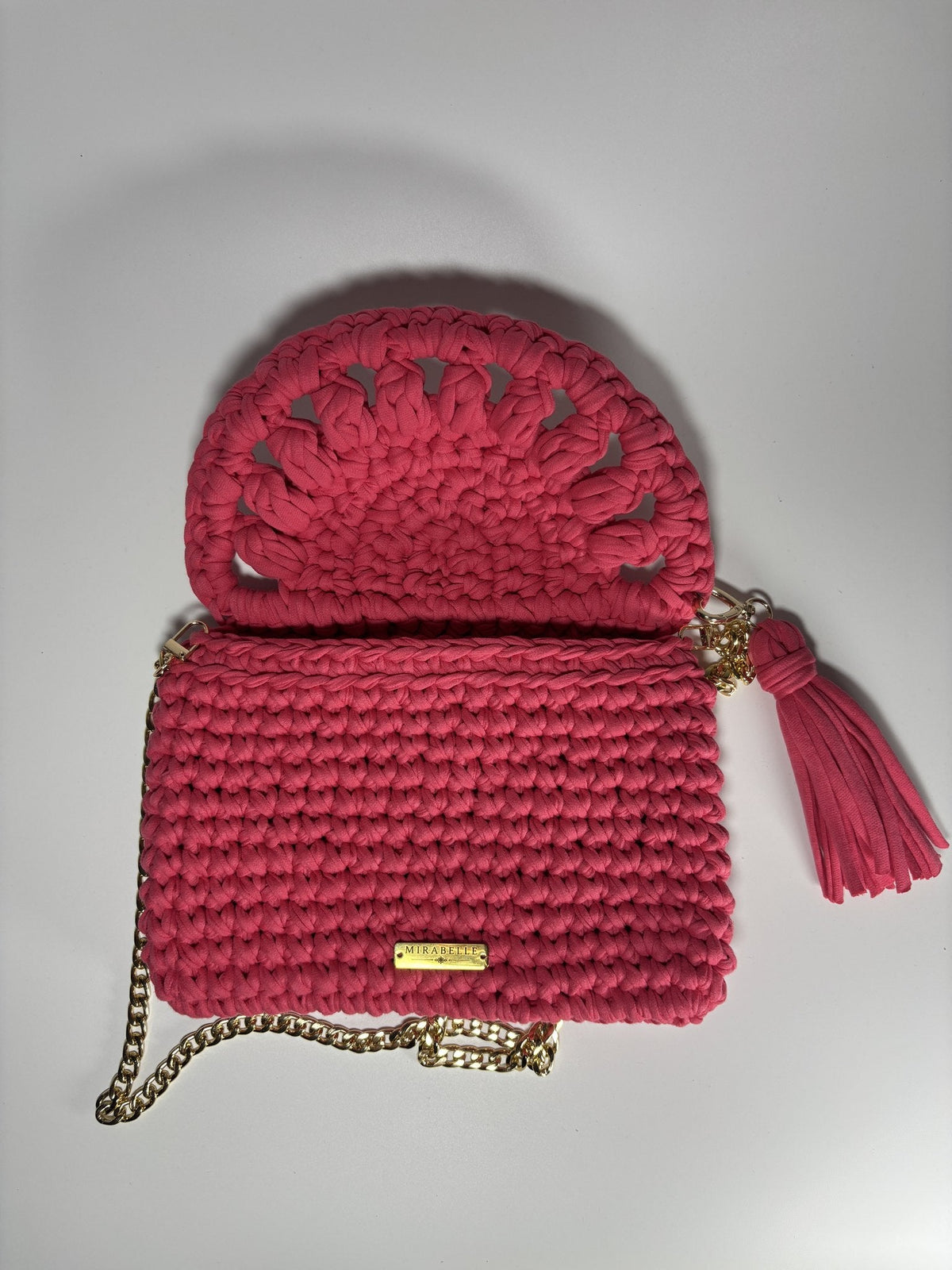 Pochette écaille corail, rabat ouvert et intérieur