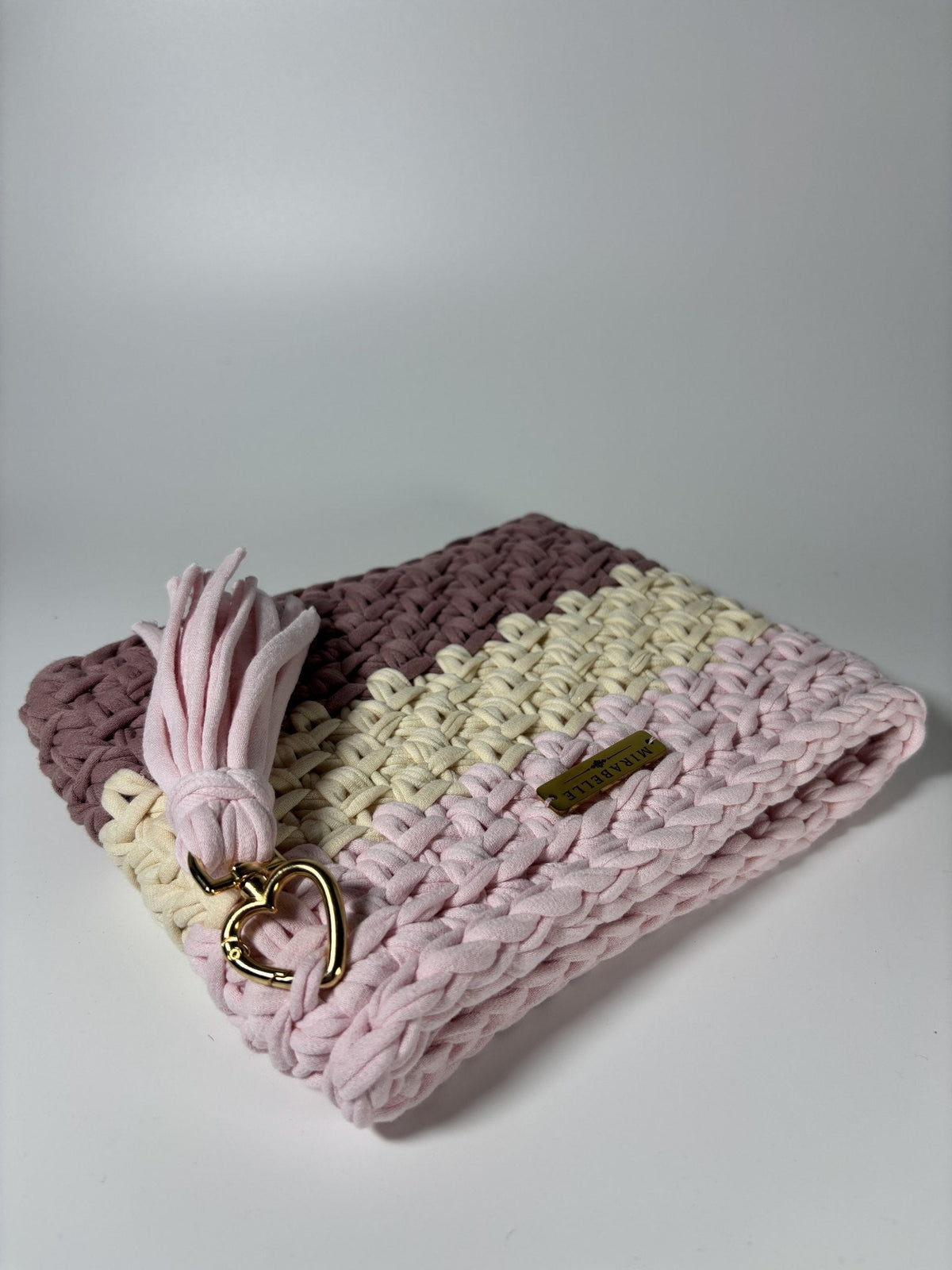Pochette rayée rose et tilleul, zip et pompon
